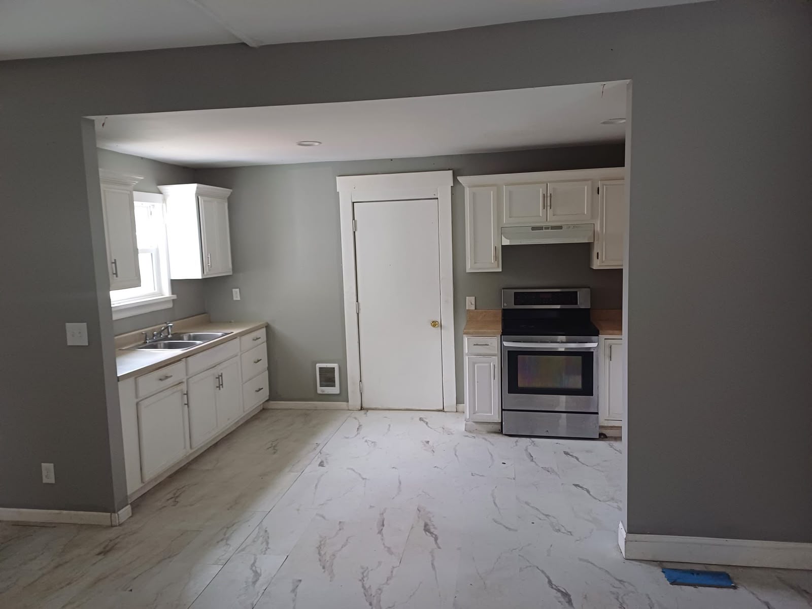 Kitchen remodel with marble floor