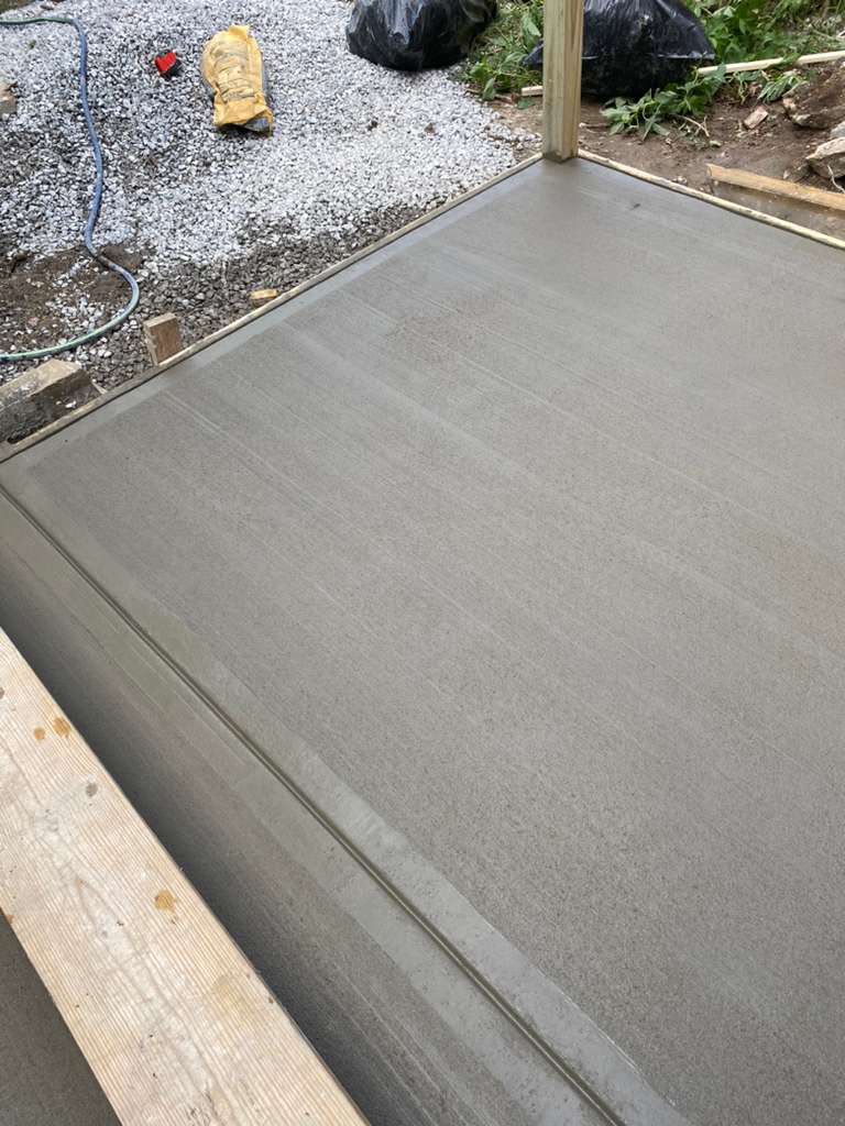 Freshly poured concrete pad