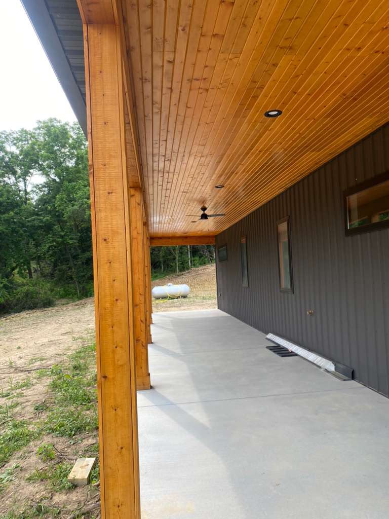 Covered porch with wood ceiling