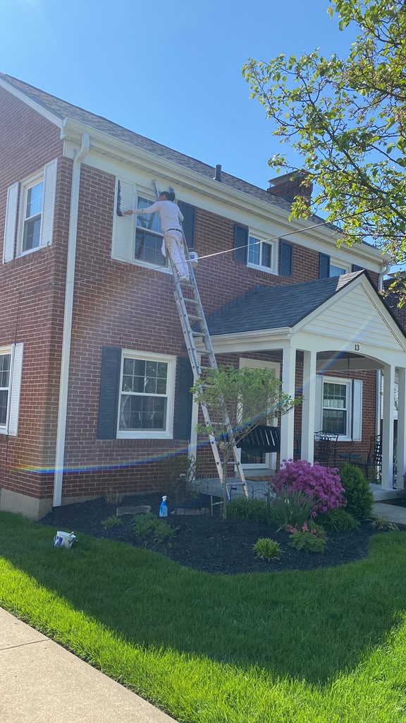 Brick home trim painting